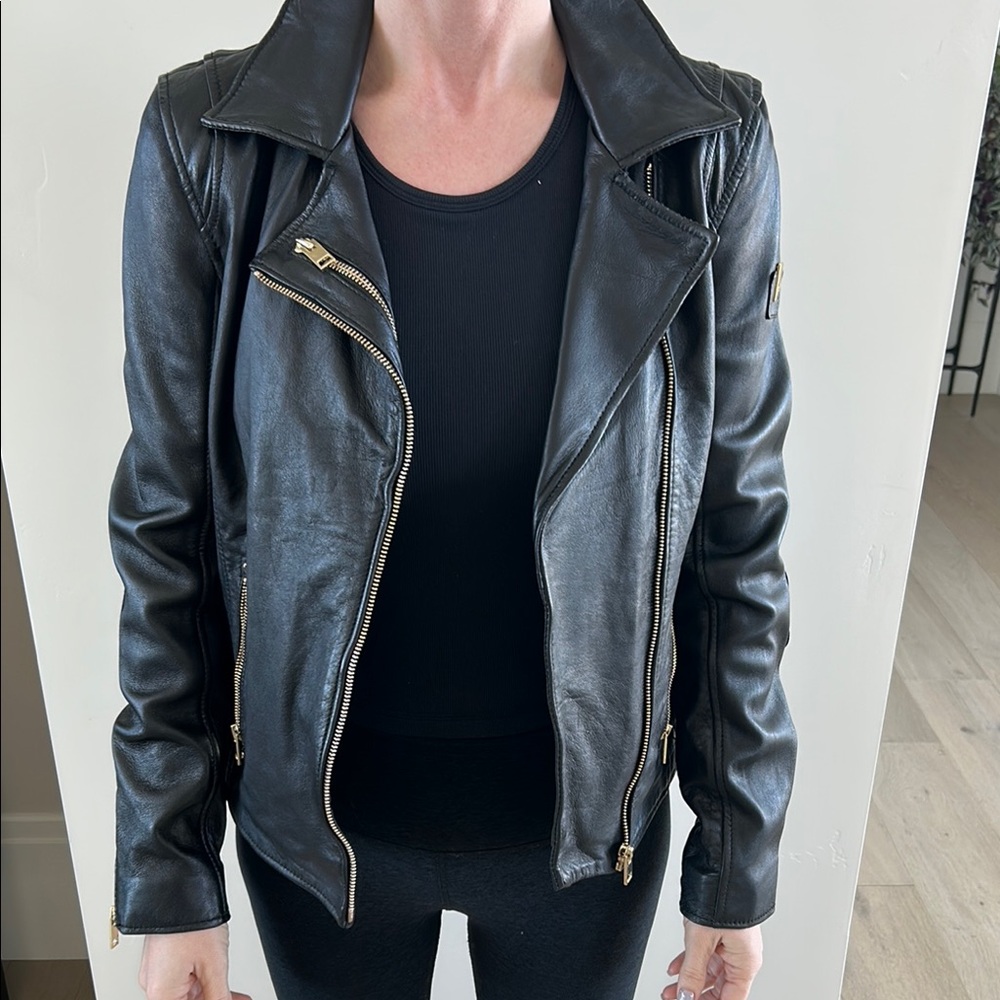 Mauritius cool leather jacket with light gold zipper. NWT